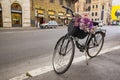 Bicycle with flowers on an street in Rome. Royalty Free Stock Photo