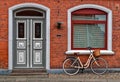 Bicycle in front of Red House Royalty Free Stock Photo