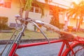 Bicycle Handle red classic vintage in former beautiful on the road with light sunrise tone Royalty Free Stock Photo