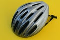 Bicycle helmet for cyclist.Protective helmet.Yellow background. Royalty Free Stock Photo