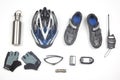 Bicycle helmet, glasses, gloves, bottle, walkie-talkie, camera and cycling shoes on a white background Royalty Free Stock Photo