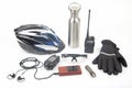 Bicycle helmet, glasses, gloves, bottle, walkie-talkie, camera and cycling shoes on a white background Royalty Free Stock Photo