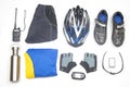 Bicycle helmet, glasses, gloves, bottle, walkie-talkie, sportswear and cycling shoes on a white background Royalty Free Stock Photo