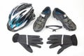 Bicycle helmet, glasses, gloves and cycling shoes on a white background Royalty Free Stock Photo