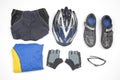 Bicycle helmet, glasses, gloves, sportswear and cycling shoes on a white background Royalty Free Stock Photo