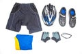 bicycle helmet, glasses, gloves, sportswear and cycling shoes on a white background Royalty Free Stock Photo