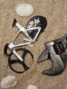 bicycle and keys on beach sandrock Royalty Free Stock Photo