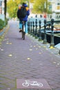 Bicycle lane sign in Amsterdam Royalty Free Stock Photo