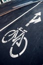 Bicycle lane sign on the road Royalty Free Stock Photo