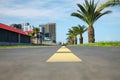 Bicycle lane with yellow dividing lines painted on asphalt, closeup Royalty Free Stock Photo