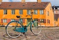 Bicycle of locals on street with colorful historical buildings in traditional style of Copenhagen, Denmark. Old houses