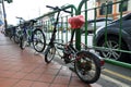 Bicycle locked in the fence of Singapore Royalty Free Stock Photo