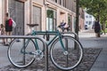 Bicycle locked to the u-rack on a street