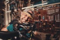 Bicycle mechanic in a workshop in the repair process Royalty Free Stock Photo