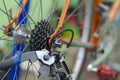 Bicycle mechanic in a workshop in the repair process, holds a tool in his hand Royalty Free Stock Photo