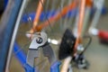 Bicycle mechanic in a workshop in the repair process, holds a tool in his hand Royalty Free Stock Photo