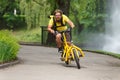 Bicycle messenger with cargo bike speeding Royalty Free Stock Photo