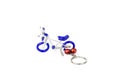 Bicycle model keychain made of wire and blue plastic Royalty Free Stock Photo