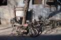 Bicycle and Motorbike in front of a courtyard door in Beijing