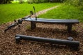 Bicycle near bench in park Royalty Free Stock Photo