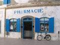 A bicycle next to a pharmacy in Essaouira, Morocco