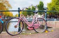 Bicycle parked at the bridge Royalty Free Stock Photo