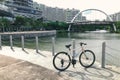 Bicycle parked at Waterway Point with background of Public Housing Apartments