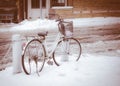 Bicycle parked in winter scene