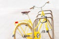 Bicycle in the parking lot. Beautiful vintage yellow bike Royalty Free Stock Photo