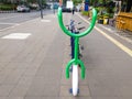 Bicycle parking lot on a sidewalk in the city of Jakarta, Indonesia at morning.