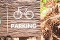 Bicycle parking sign made from wood