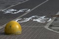 Bicycle path and concrete hemisphere limiter Royalty Free Stock Photo