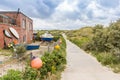 Bicycle path through the dunes at a restaurant in Borkum Royalty Free Stock Photo