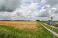 Bicycle path through dutch landscape Royalty Free Stock Photo