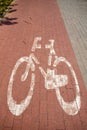 Bicycle path and sign denoting a place for bicycles. A place for active recreation Royalty Free Stock Photo