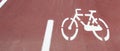 Bicycle path, two way cycling track with bicycle signs painted white Royalty Free Stock Photo