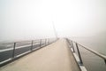 Bicycle pedestrian bridge with fog