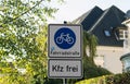 Bicycle and pedestrian lane road sign on pole post. Royalty Free Stock Photo