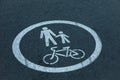 Bicycle and pedestrian lane sign on the asphalt road Royalty Free Stock Photo