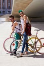 Bicycle, portrait and friends or men in city streetwear for college, university or outdoor travel in summer. Cool youth Royalty Free Stock Photo