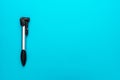 Bicycle pump over turquoise blue background with copy space Royalty Free Stock Photo