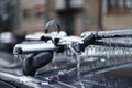 Bicycle rack on a car covered in ice after frozen rain Royalty Free Stock Photo
