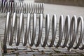 Bicycle rack that looks like a large steel spring Royalty Free Stock Photo