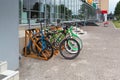 Bicycle rental Parking on a city street in summer. Russia, Kazan on 24 June 2019