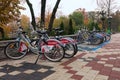 Bicycle rental spot near Shevchenko park in Kyiv. Close up of rental bicycles. Bike sharing service