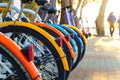Bicycle rentals, colorful bicycles in the parking lot. Royalty Free Stock Photo