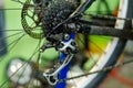 Bicycle repair. Dirty rear derailleur and bike cassette. Close-up Royalty Free Stock Photo