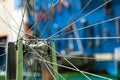 Bicycle repair. The front wheel is on a stand on the background of the board with tools. Rim and spokes close-up. Mechanic levels Royalty Free Stock Photo