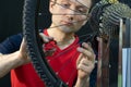 Bicycle repair. Rear wheel and tire closeup. Mechanic repairing spokes of the rear wheel of a mountain bike. Bike mechanic in the Royalty Free Stock Photo