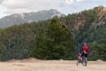 Bicycle rider and rocky mountain view Royalty Free Stock Photo